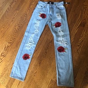 Levi high rise jean with rose embellishments